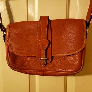 Authentic Dooney & Burke rust colored crossbody